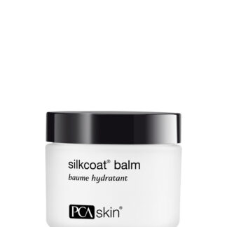 PCA Skin Silkcoat Balm in a white jar with black lid.